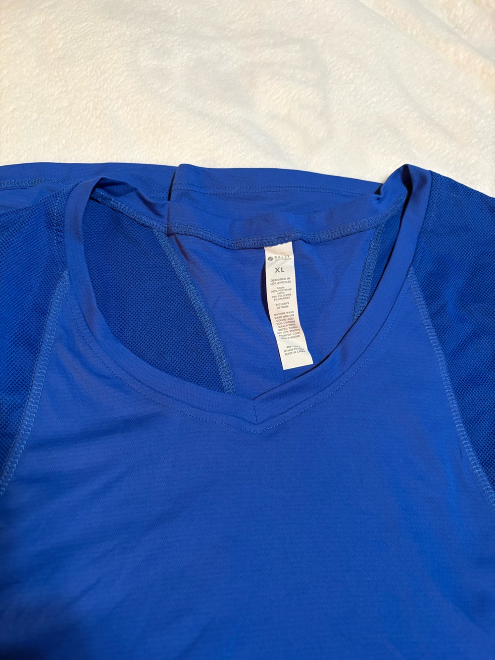 Bally Royal Blue Performance V-Neck Top- New without tags on this one